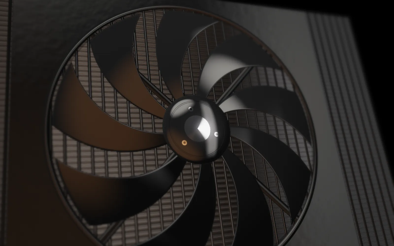 Nine-blade radiator cooling fan in front of an aluminium radiator core